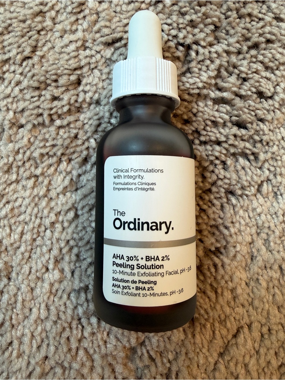 The Ordinary Peeling Solution Bottle in Black and White